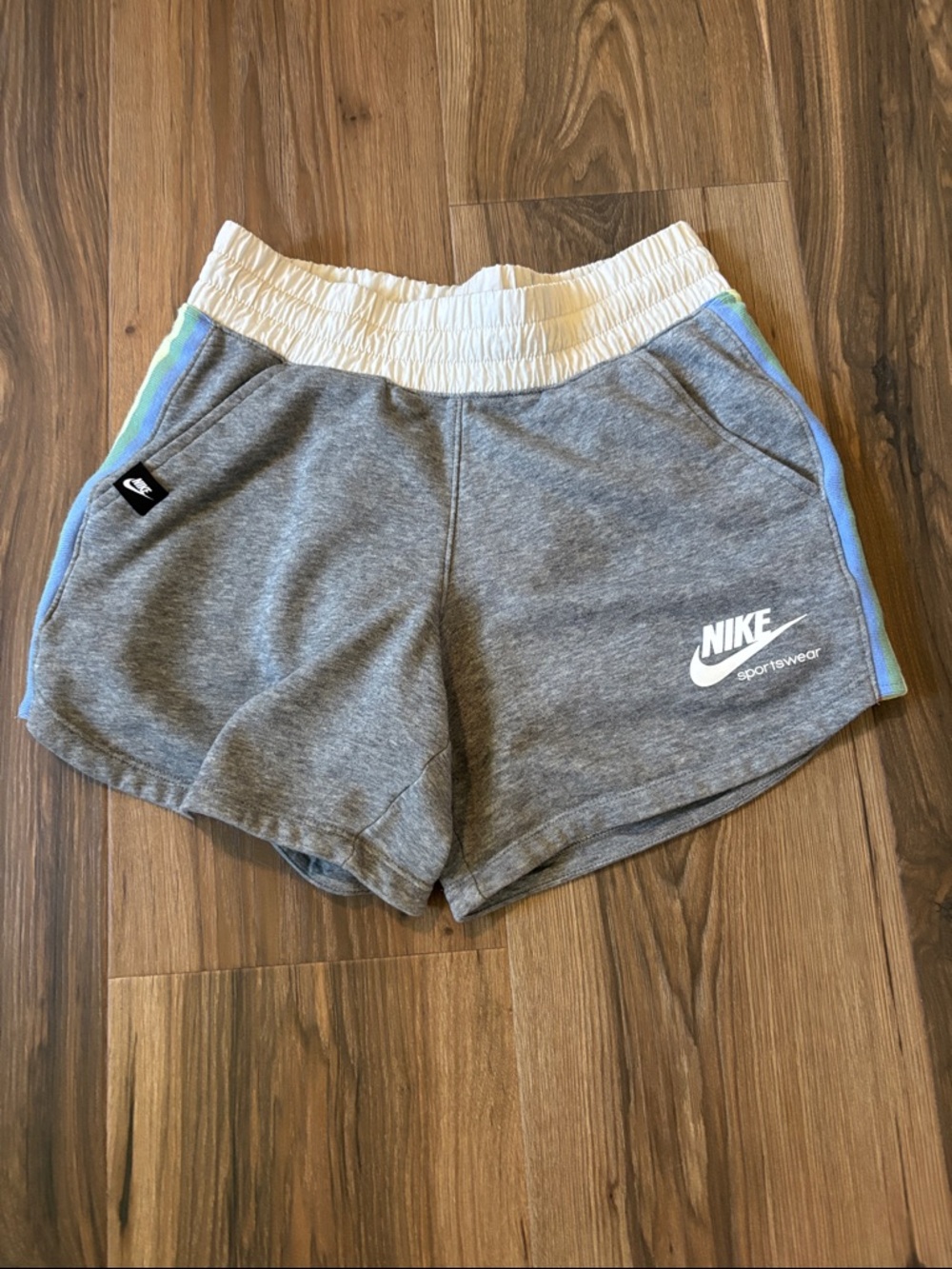 Nike Gray Heritage Shorts with White Waistband and Blue Trim medium